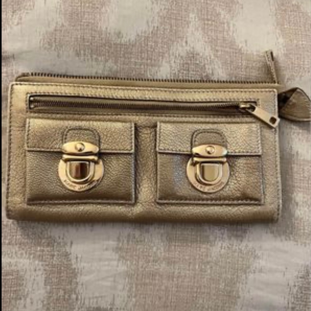 Marc by Marc Jacobs gold wallet. Slight interior staining as pictured
